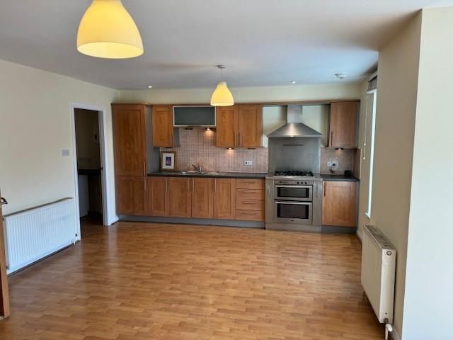 Property photo 2 of 12 Kitchen Area