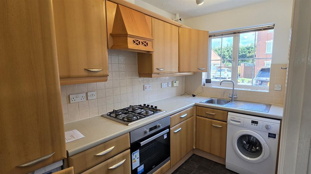 Property photo 2 of 12 Kitchen