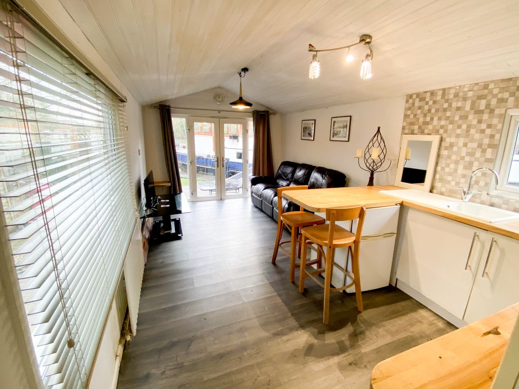 Property photo 2 of 8 Cabin Kitchen_Lounge