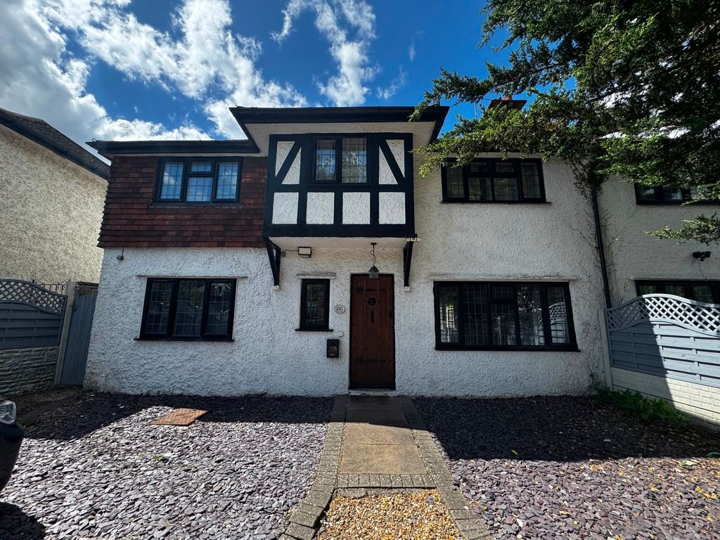 Property photo 1 of 22 Charming Tudor-Style House With Bright Exterior...