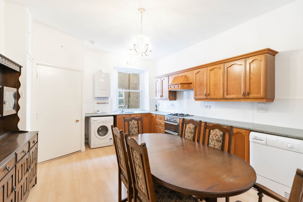 Property photo 2 of 28 Dining Kitchen
