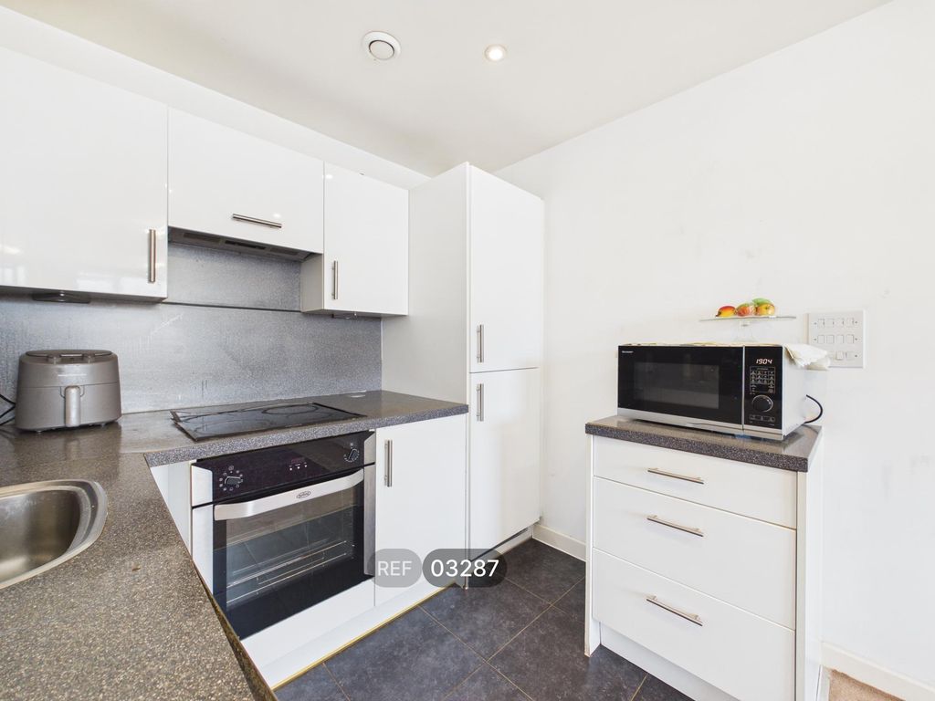 Property photo 1 of 12 Kitchen / Living Area