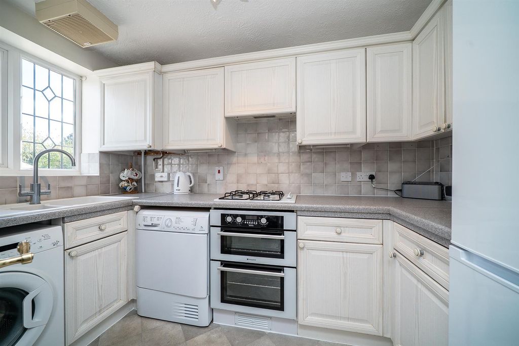 Property photo 3 of 12 Kitchen