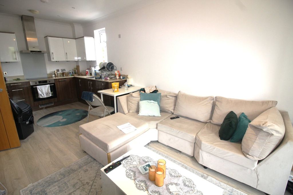 Property photo 1 of 9 Living Area