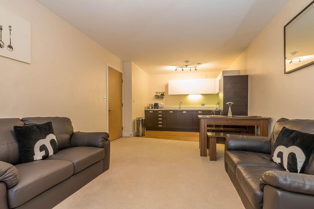 Property photo 2 of 11 Living Area