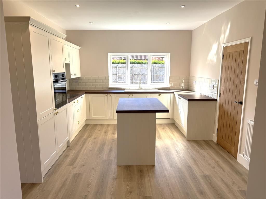 Property photo 2 of 12 Kitchen
