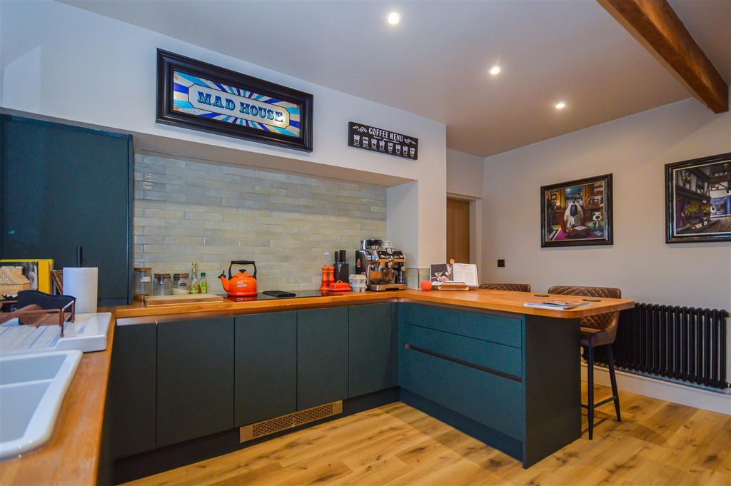 Property photo 3 of 13 Dining Kitchen