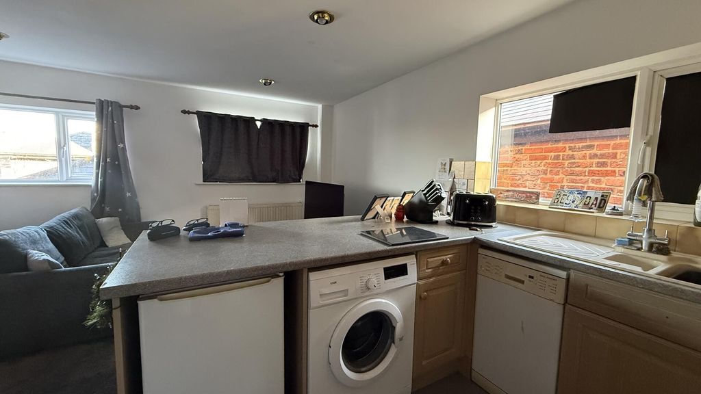 Property photo 2 of 12 Kitchen