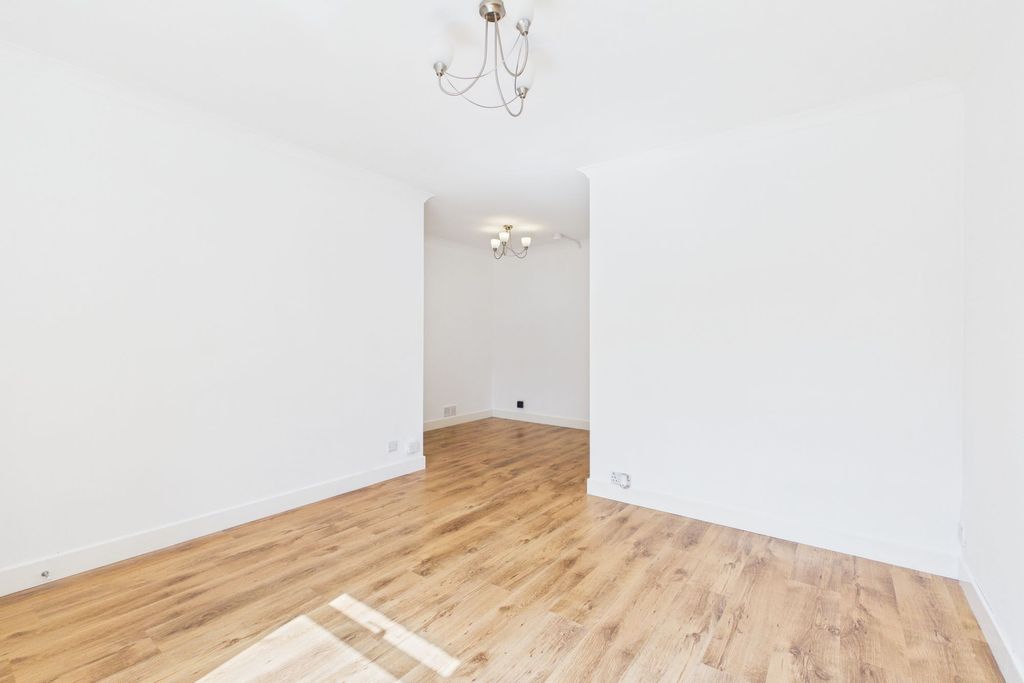 Property photo 3 of 11 Living Room &amp; Dining Area