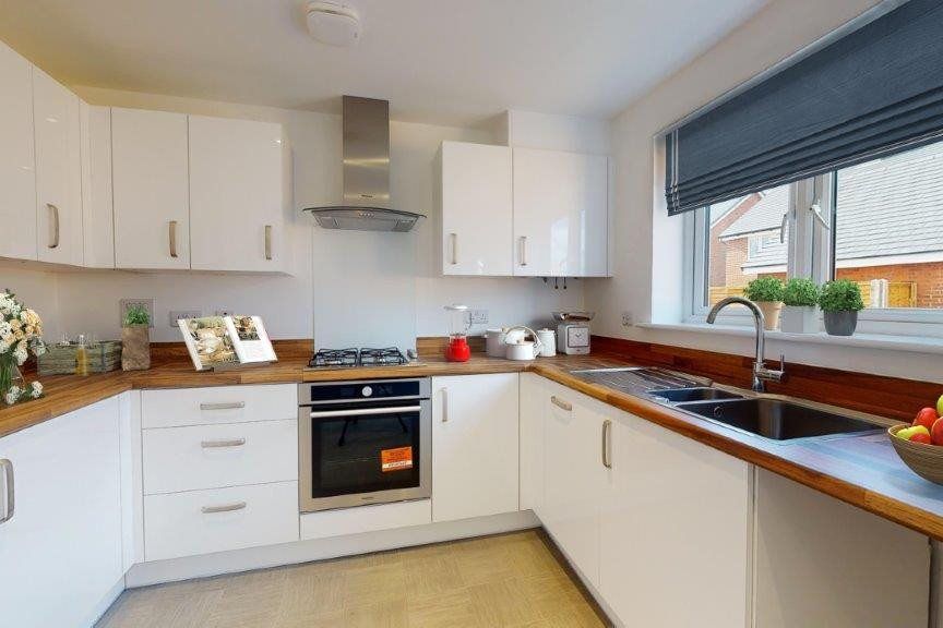 Property photo 3 of 8 Kitchen