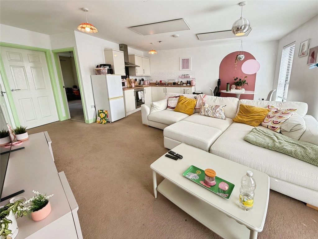 Property photo 3 of 12 Living Area