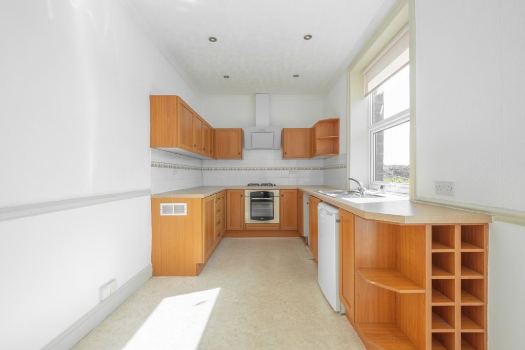Property photo 3 of 16 Dining Kitchen