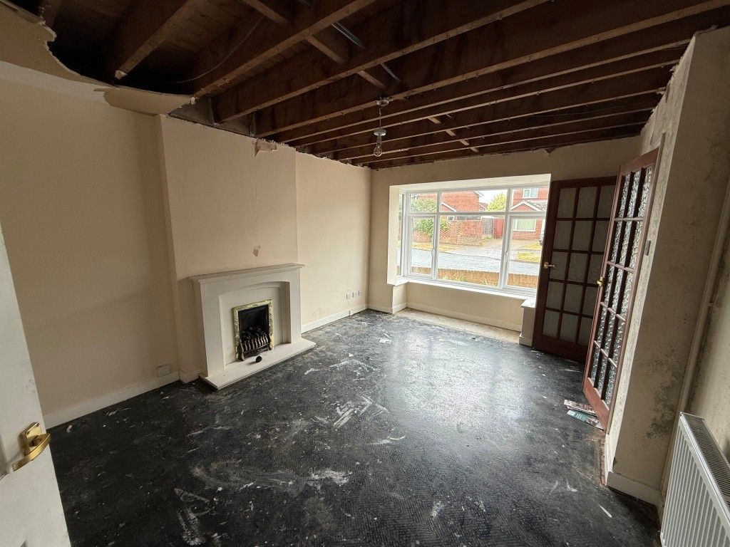 Property photo 3 of 13 Living Room Looking Towards The Front Bay Window