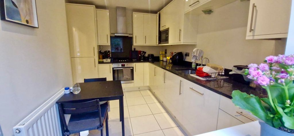 Property photo 3 of 16 Kitchen