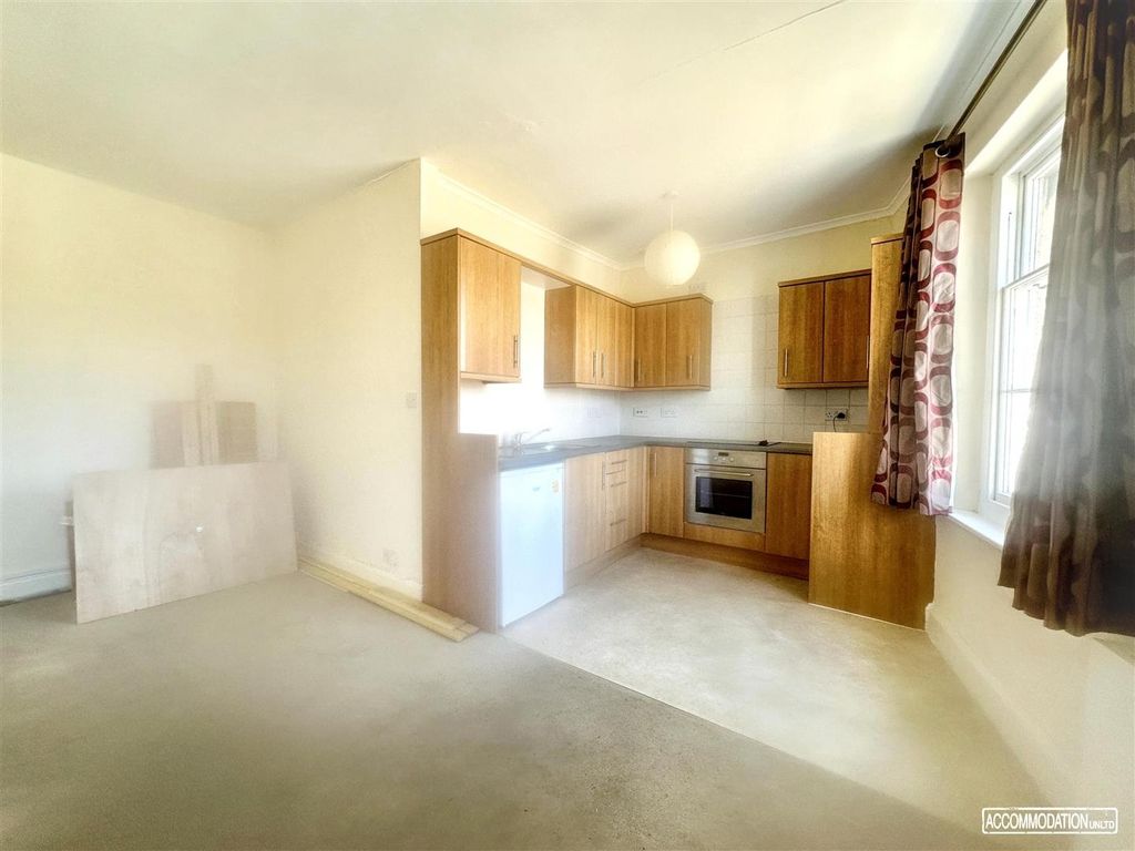 Property photo 2 of 10 Bright Kitchen With Ample Wooden Cabinetry....