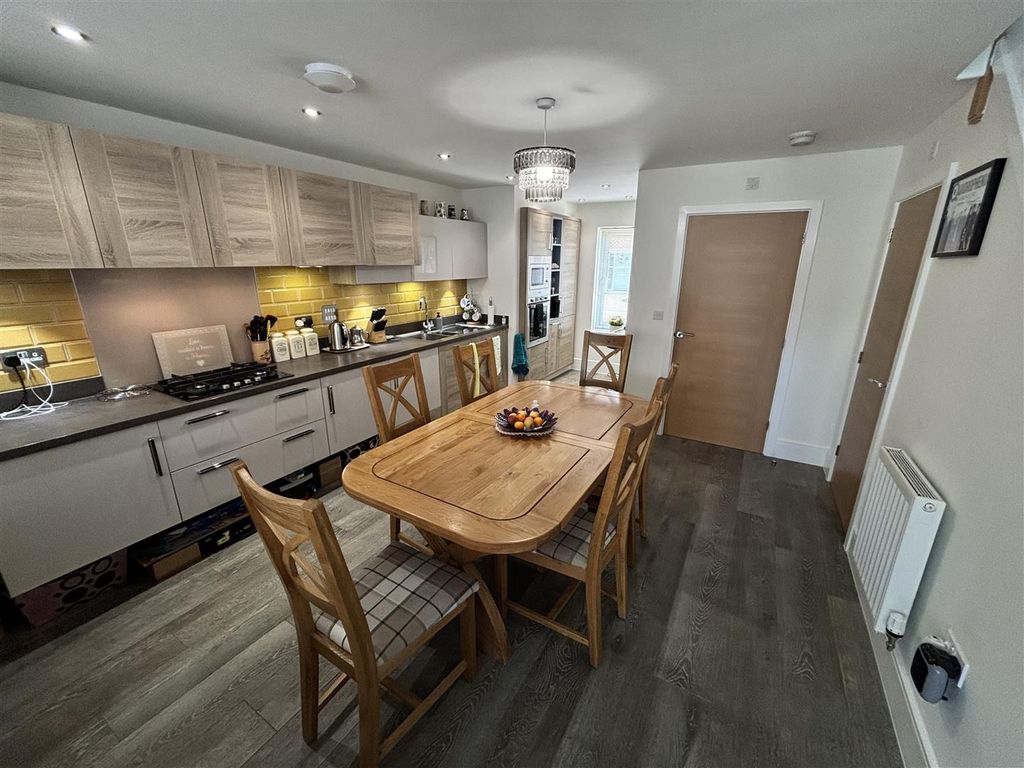 Property photo 3 of 17 Kitchen And Dining Area