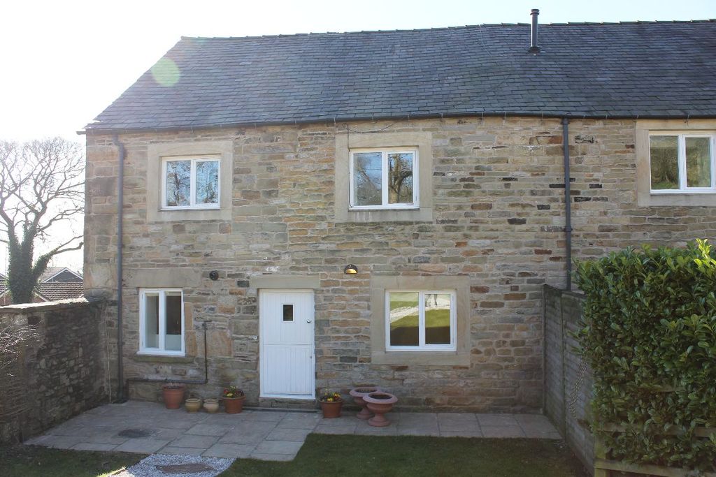 Property photo 3 of 25 Rear