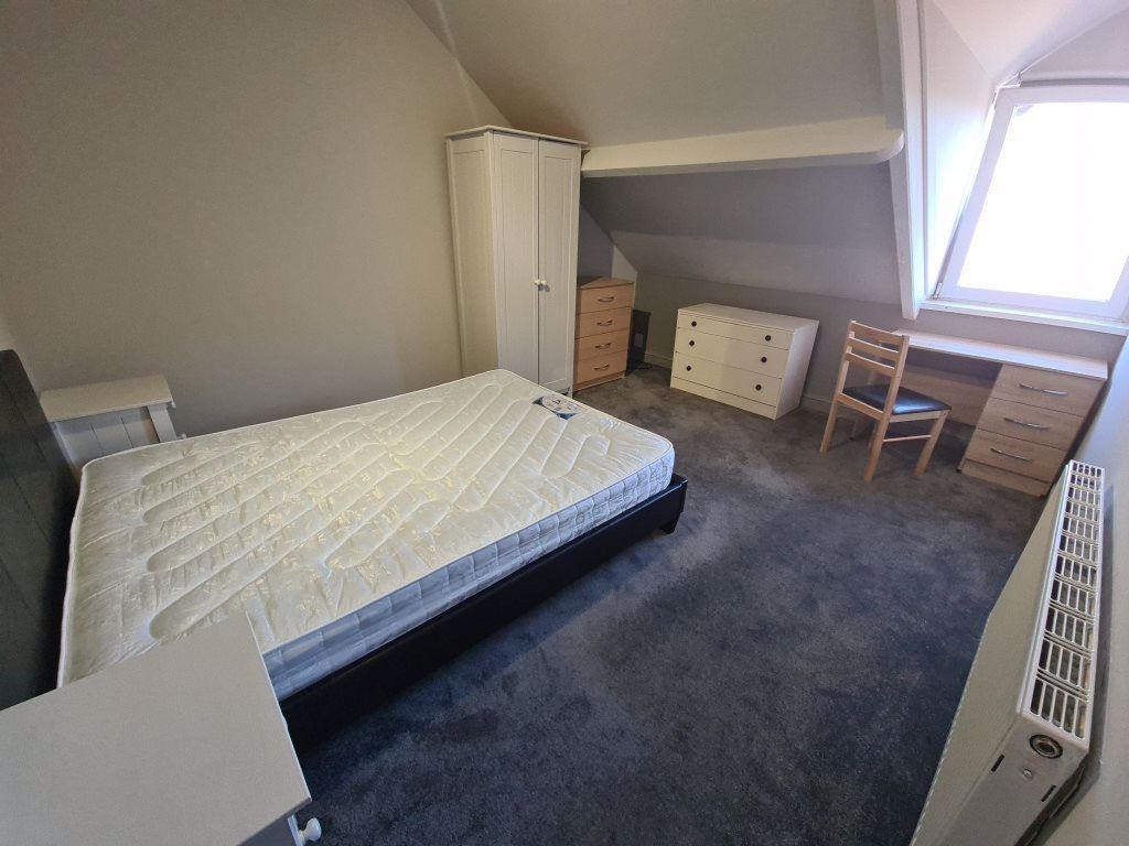 Property photo 1 of 21 A Bright And Airy Master Bedroom Featuring A Large...