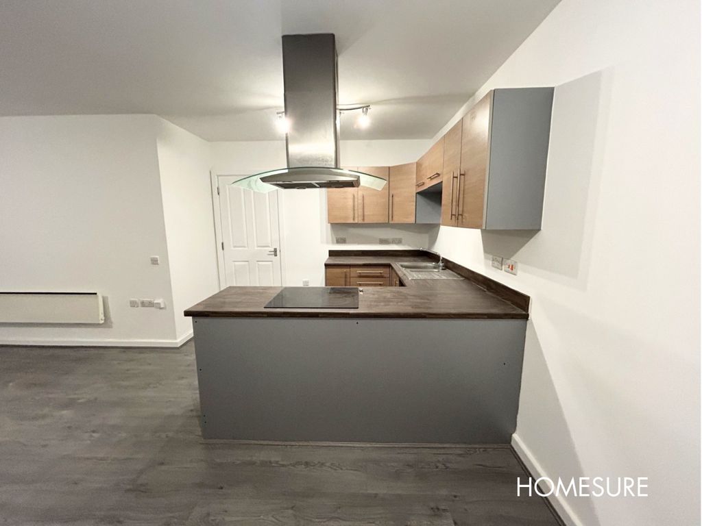Property photo 3 of 12 Kitchen