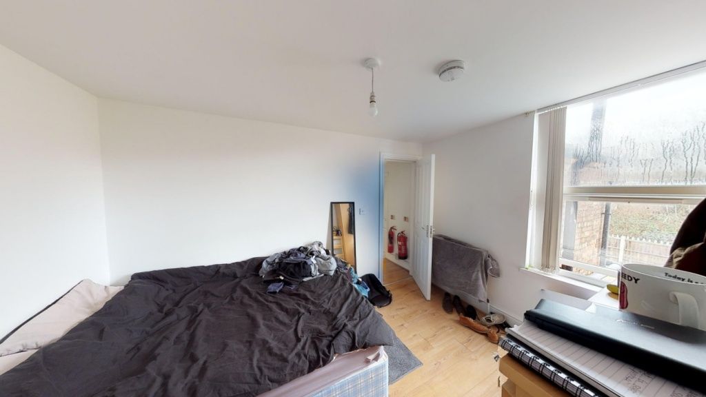 Property photo 3 of 10 A Bright Double Bedroom Featuring A Large Window T...