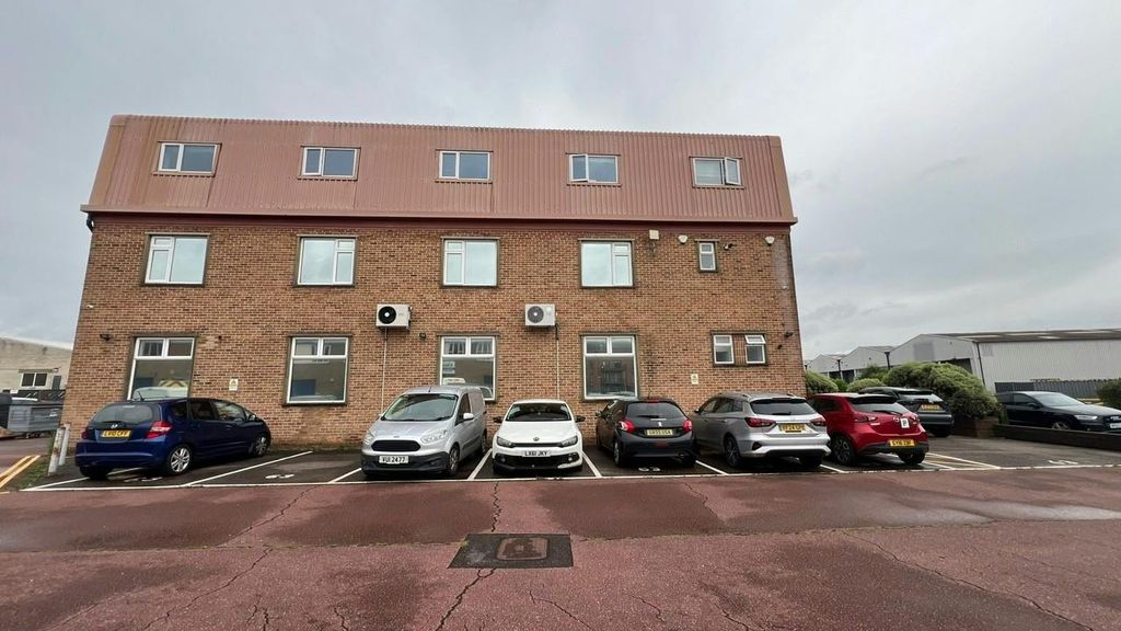 Property photo 2 of 9 South Elevation And Parking Spaces