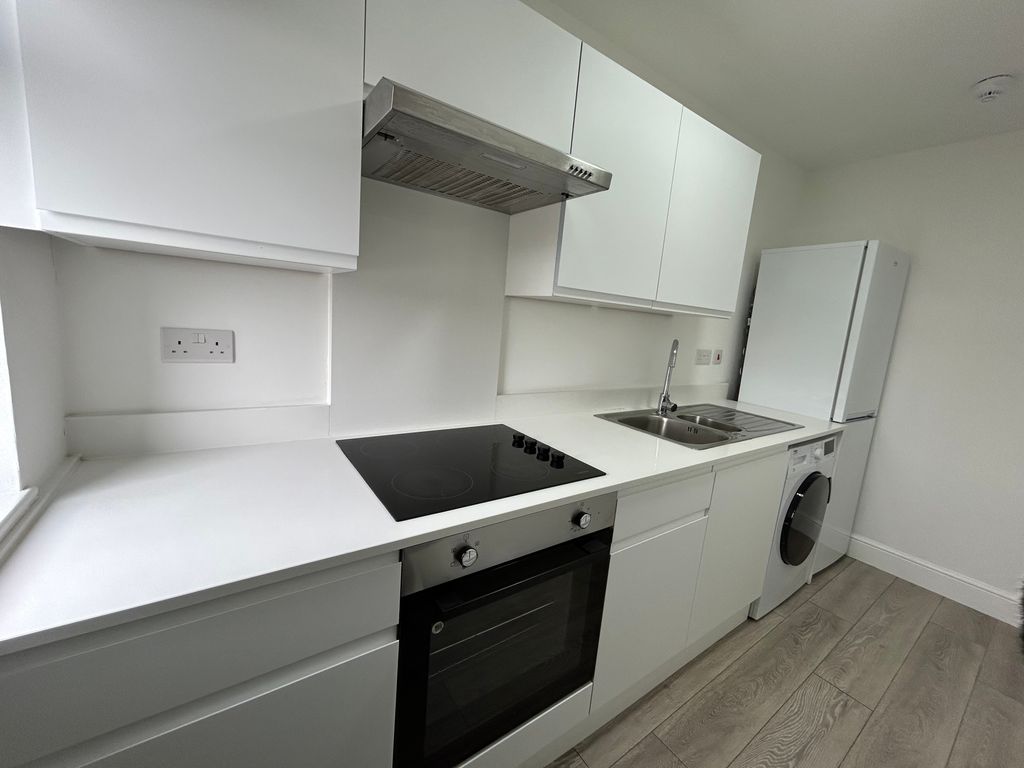 Property photo 1 of 6 Kitchen