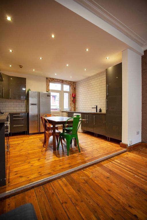 Property photo 3 of 13 Modern Kitchen With Stylish Dining Area....
