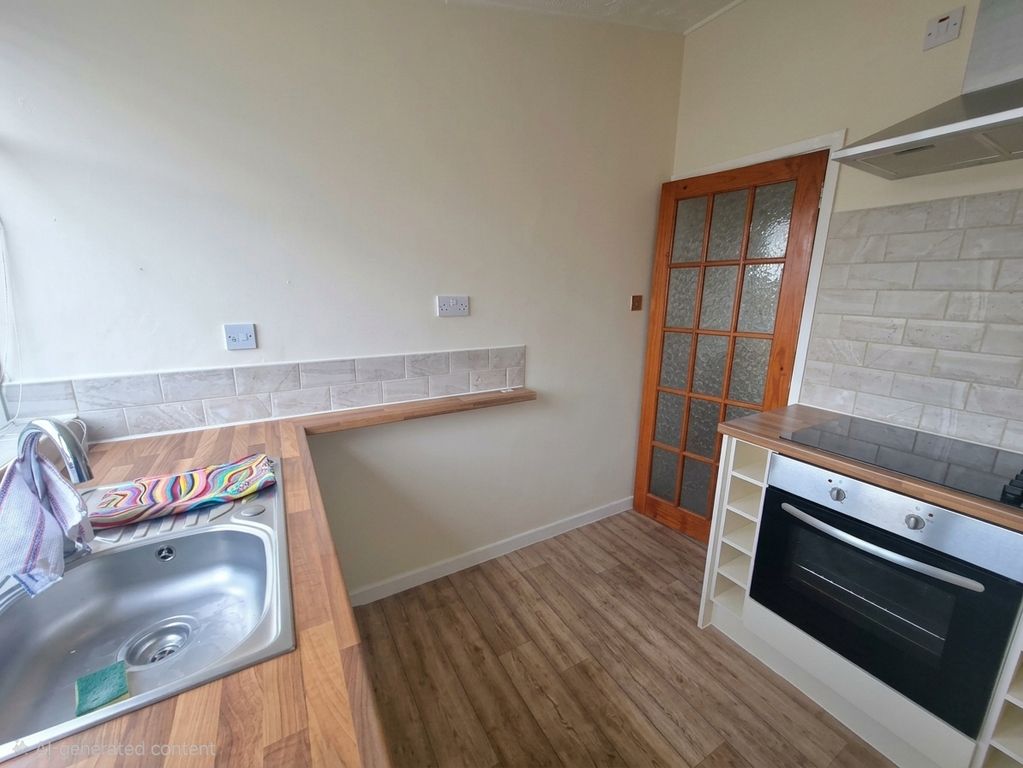 Property photo 3 of 10 Kitchen
