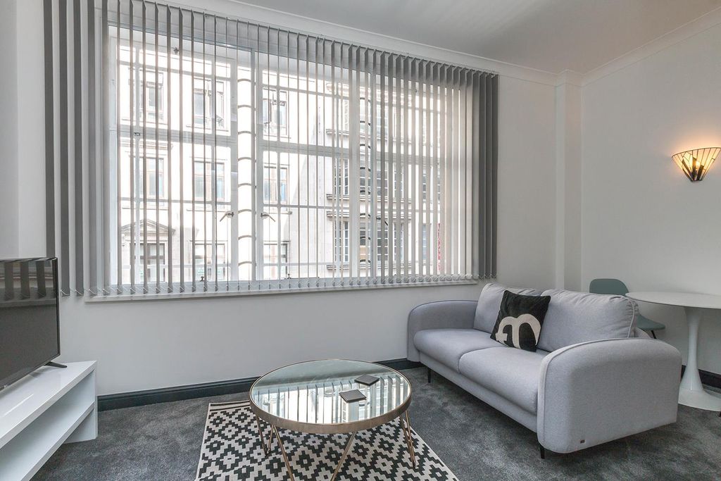 Property photo 1 of 9 Living Area