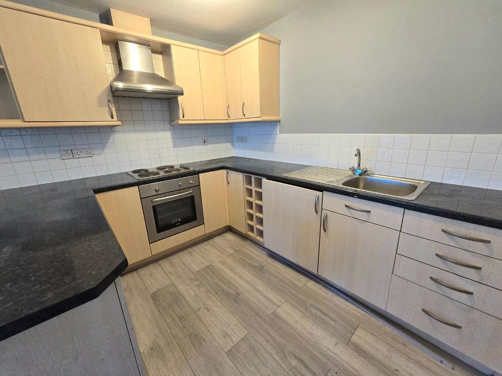 Property photo 3 of 12 Kitchen