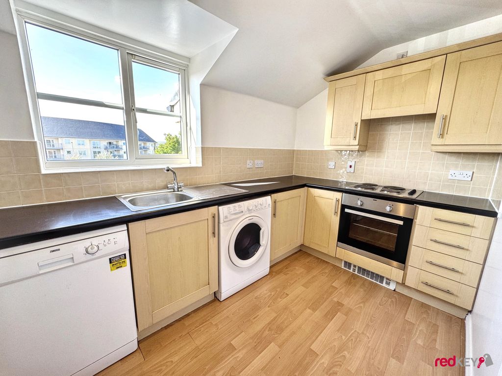 Property photo 3 of 12 Kitchen