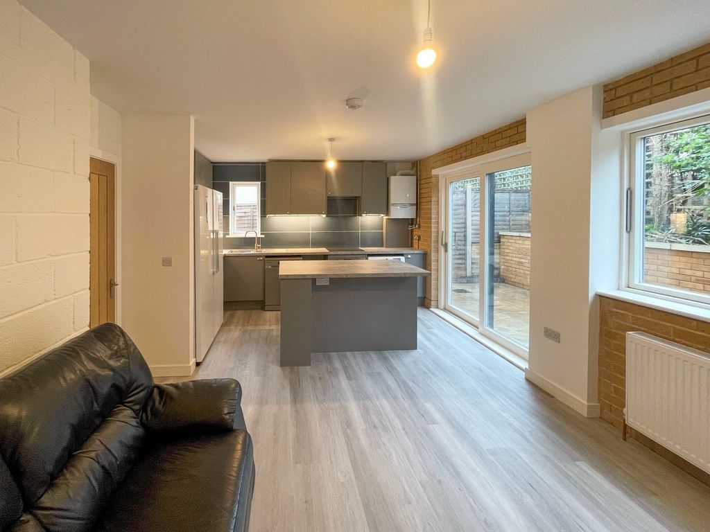 Property photo 1 of 13 Spacious And Modern Kitchen Area Featuring Sleek c...
