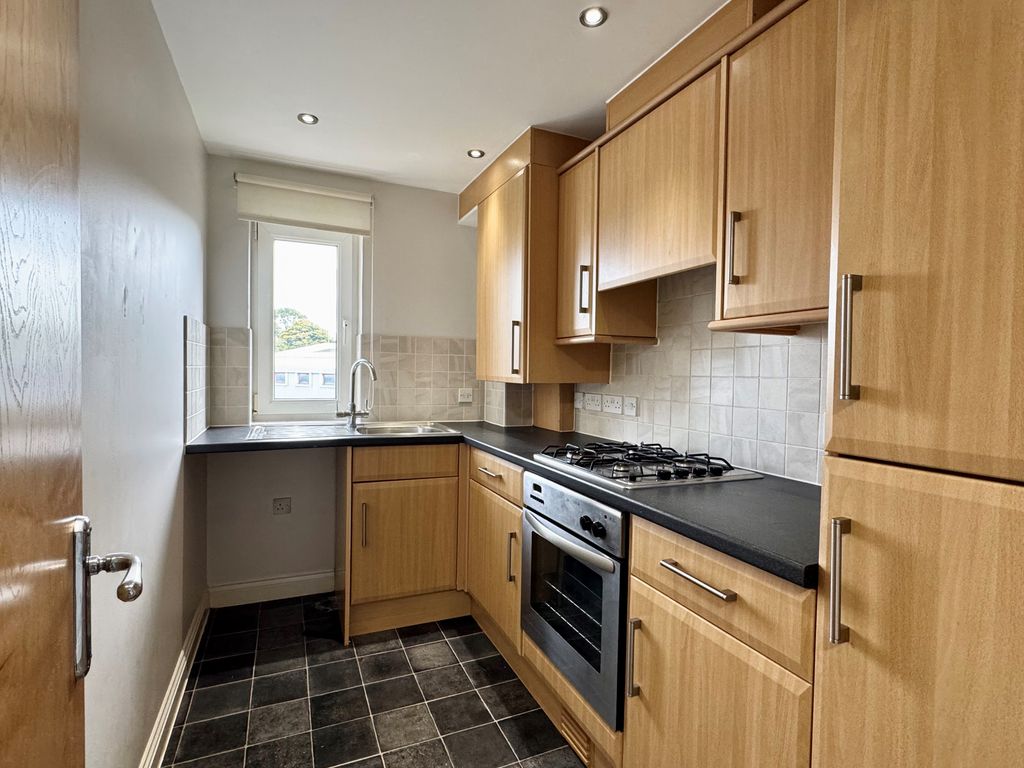 Property photo 3 of 7 Kitchen