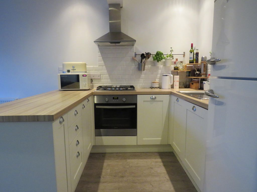 Property photo 3 of 12 Kitchen