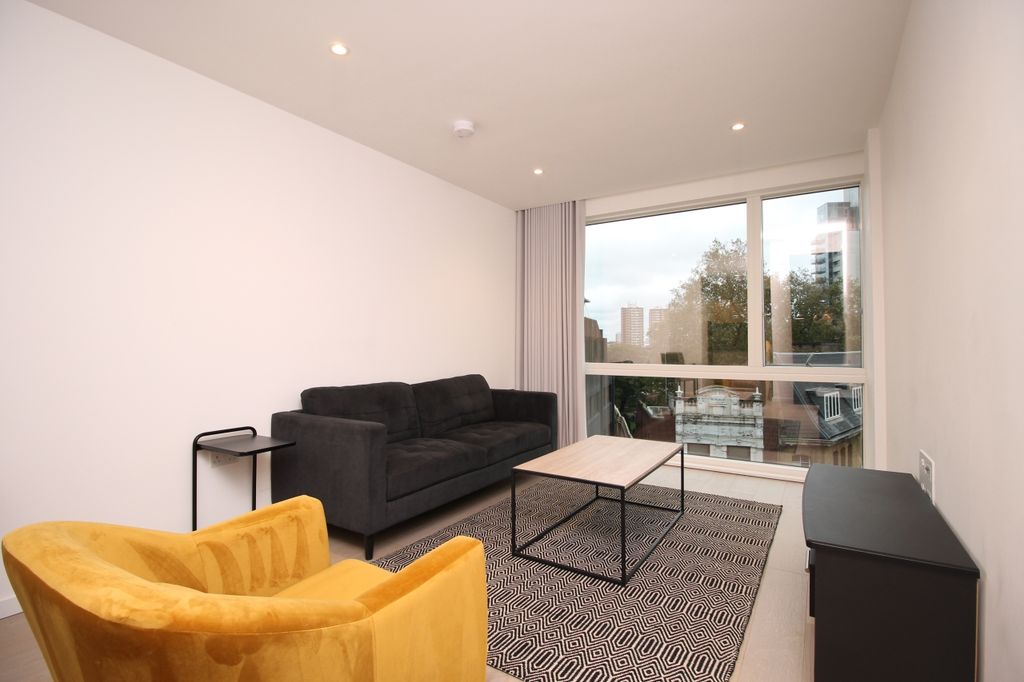 Property photo 1 of 8 Living Area