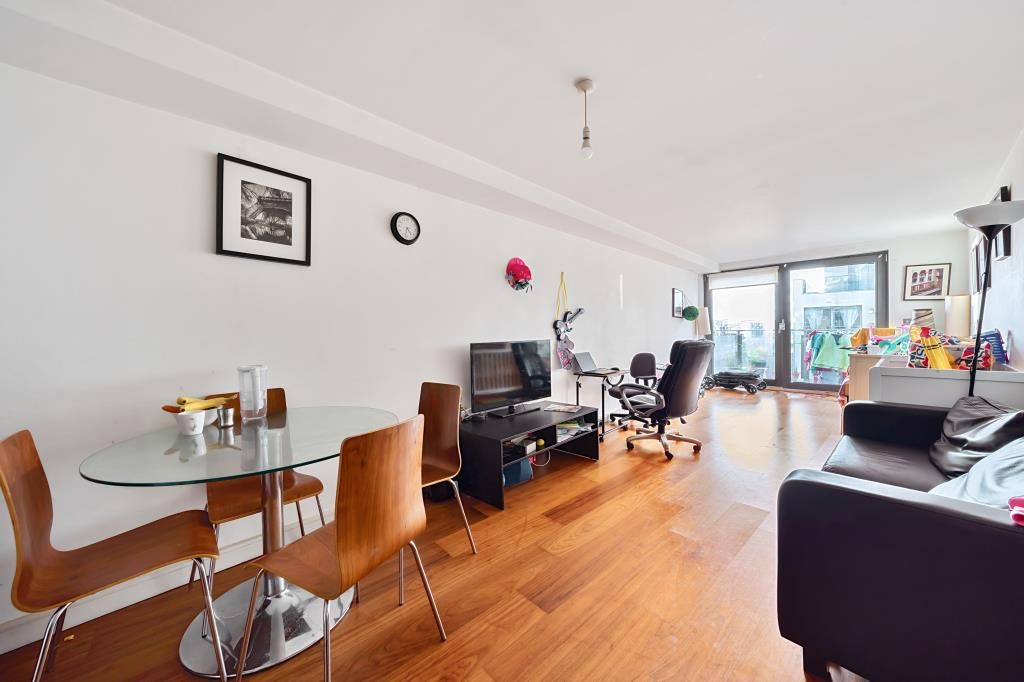Property photo 1 of 12 Living Area/Dining Area
