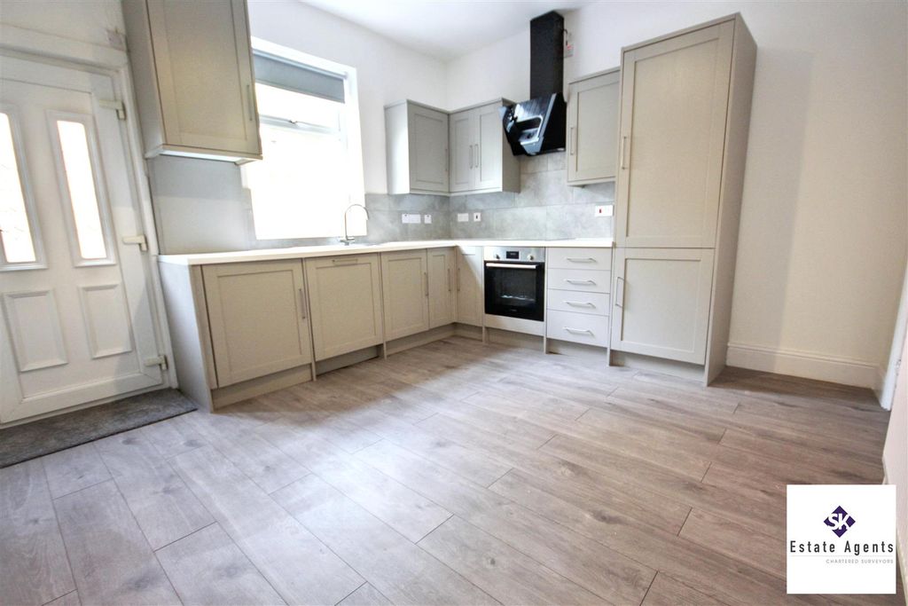 Property photo 2 of 13 Dining Kitchen