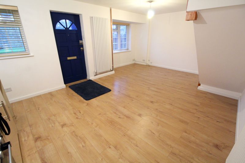 Property photo 3 of 7 Living Room Area