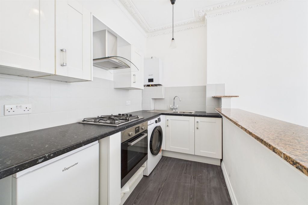 Property photo 2 of 12 Kitchen