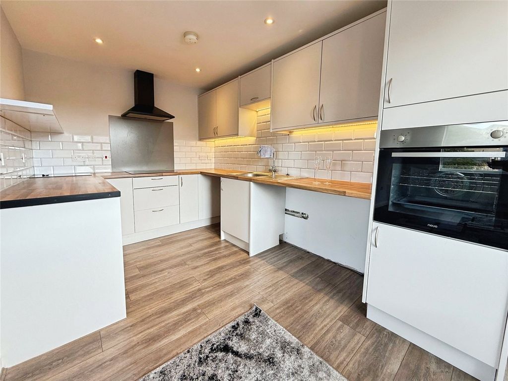 Property photo 2 of 12 Kitchen