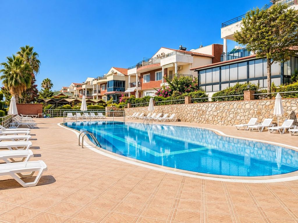Property photo 1 of 25 Seafront Semi-Detached Villa For Sale In Didim – Pool And Sunbathing Terraces