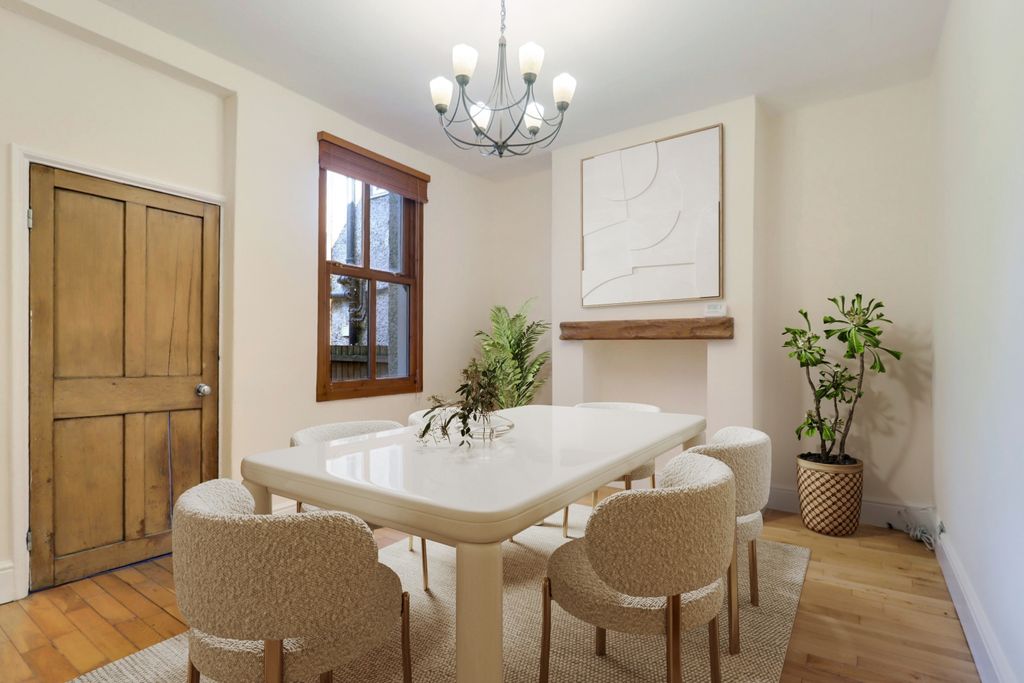 Property photo 3 of 14 Dining Room - Digitally Staged