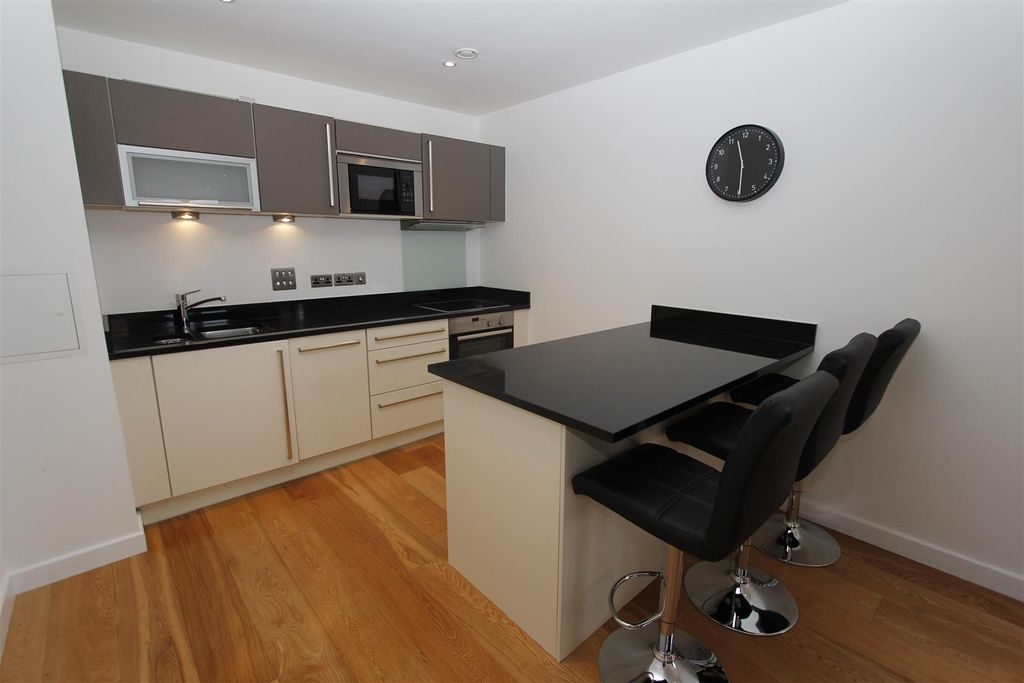 Property photo 2 of 10 Modern Kitchen With Stylish Breakfast Bar Island...