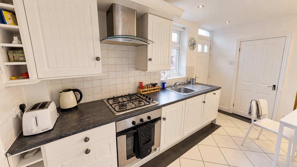 Property photo 3 of 16 Warm Scandinavian Kitchen Interior