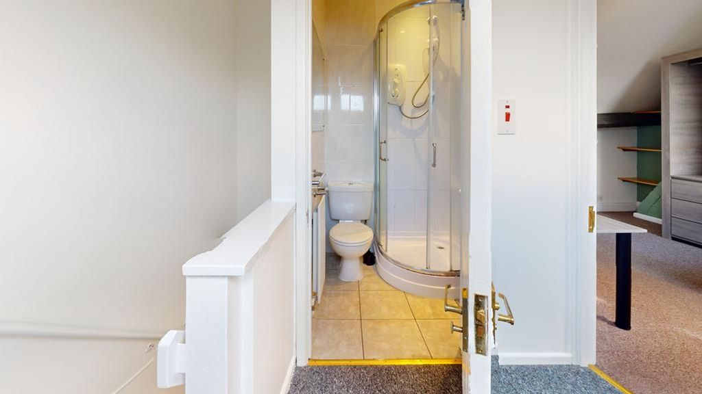 Property photo 2 of 25 A Clean And Modern Bathroom Featuring A Shower, Pe...