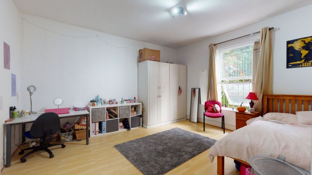 Property photo 2 of 15 Bright And Spacious Master Bedroom Featuring A Lar...