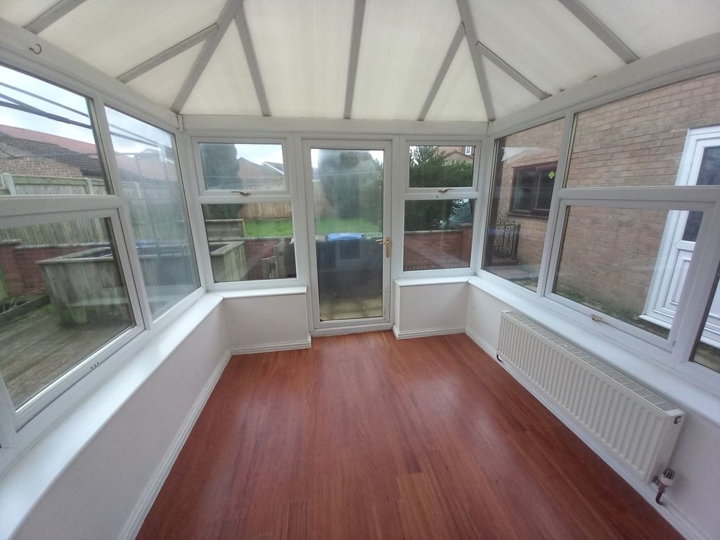 Property photo 3 of 12 Conservatory