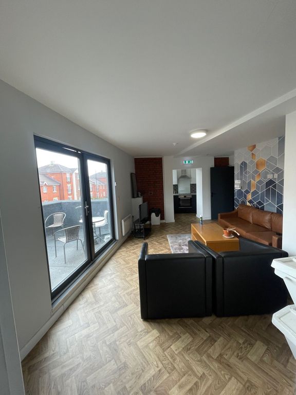 Property photo 1 of 11 Spacious And Contemporary Living Room Featuring La...