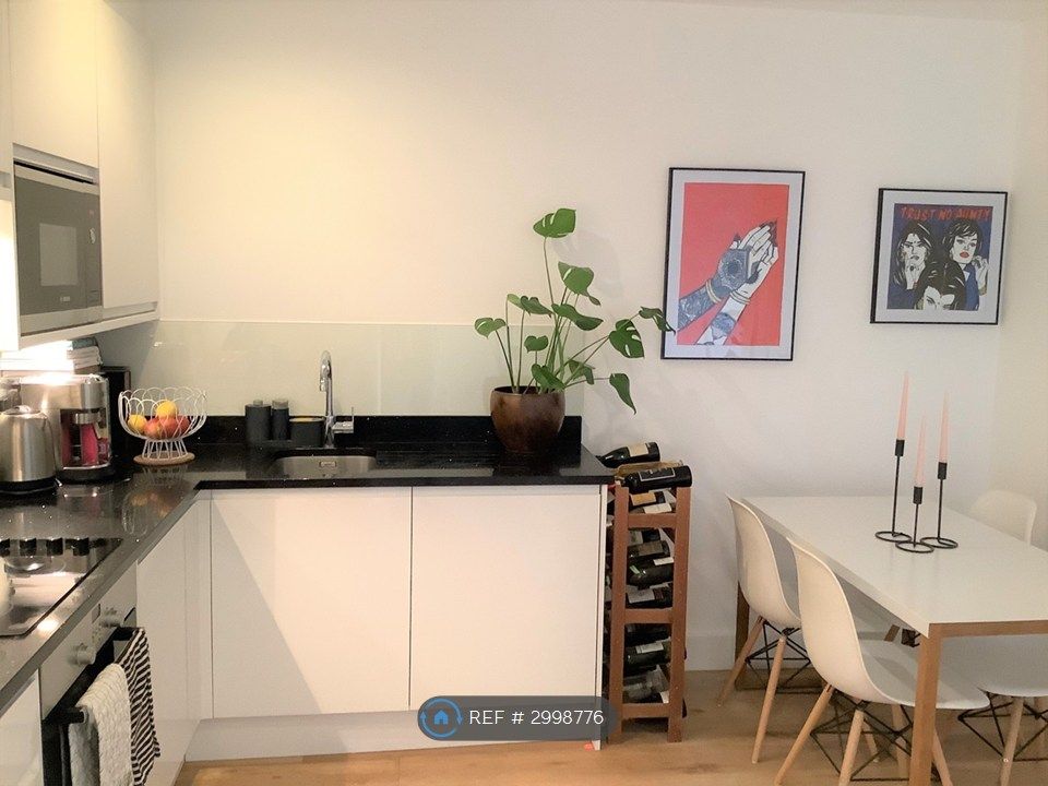Property photo 2 of 11 Kitchen-Dining Space