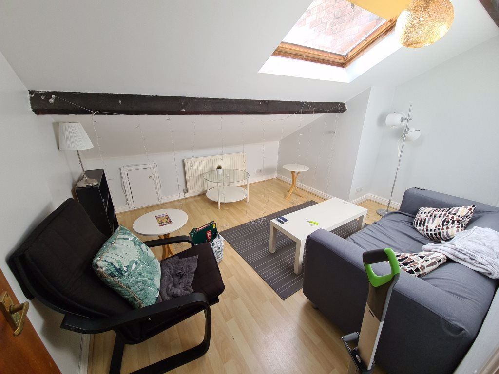 Property photo 1 of 9 Bright, Modern Living Area With Sloped Ceiling And...